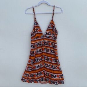 Maaji Women’s orange and Black
Patterned Mini  Dress Size Large